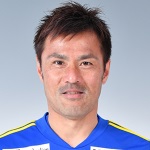 Y. Komano photo